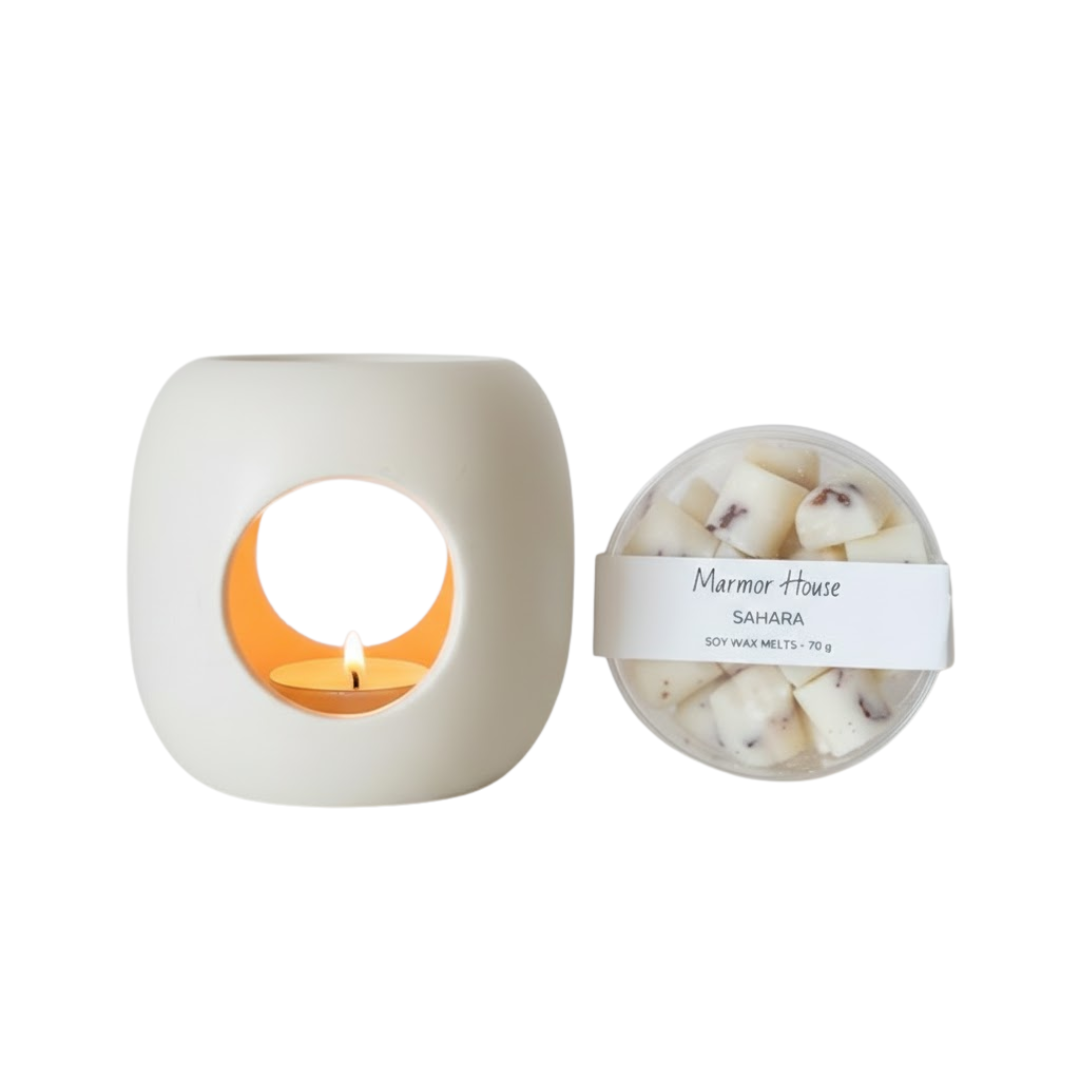 התענגו על רגעי קסם ריחניים עם מארז מושלם המשלב עיצוב, ניחוח ושלווה בביתכם!
מארז "אווירה" כולל את מבער Classic שלנו, המביא אליכם חוויה חושית מרגיעה, יחד עם פרלינים עשויים משעווה טבעית. זהו השילוב המושלם ליצירת אווירה ביתית חמימה, מפנקת ונינוחה.